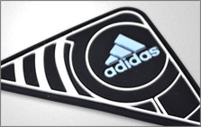 Adidas triangular silicone label